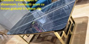 Piesa de dining ANKA ELITE cu picioare din metal placat cu Aur nikel strălucitor și blat finisat premium, expusă în showroom-ul Ferremo
